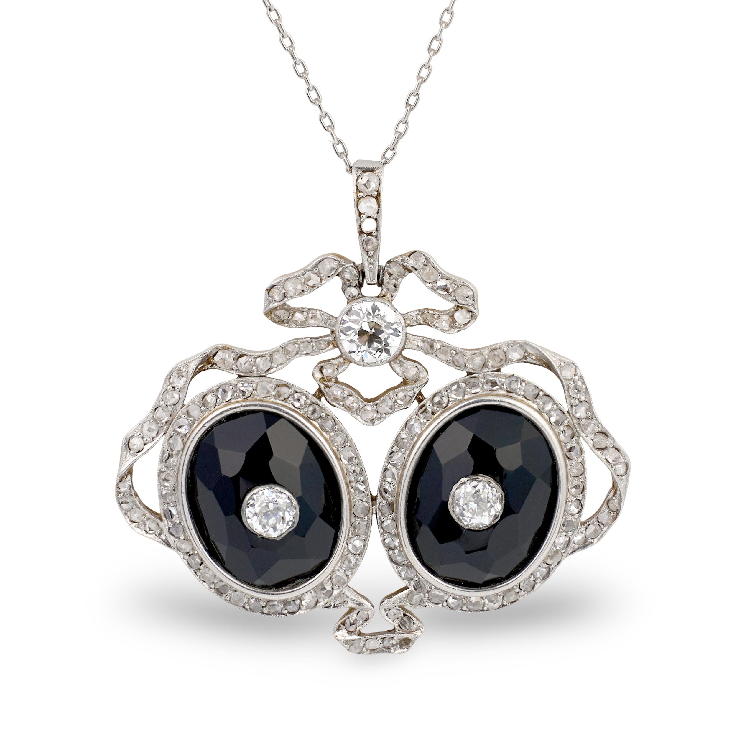Edwardian Diamond and Onyx Platinum and 18k Yellow Gold Pendant, circa 1900s