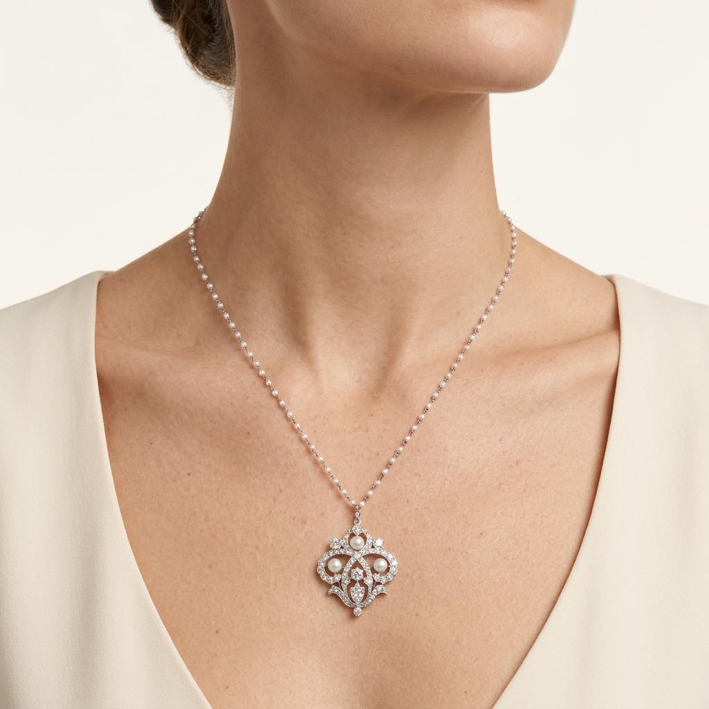Edwardian Platinum Diamond and Pearl Pendant, Circa 1910