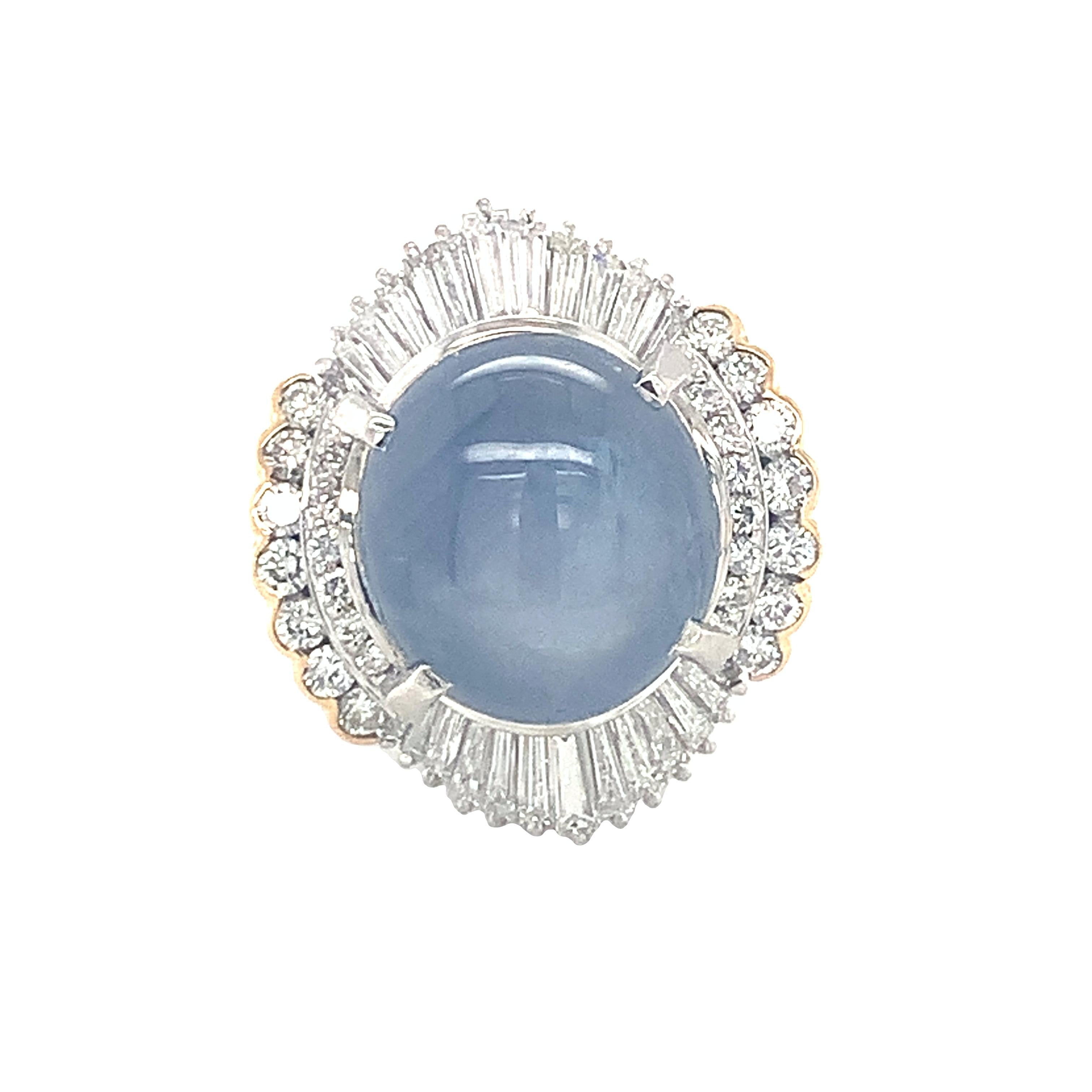 Mid-century star sapphire and diamond ring in platinum and gold, circa 1950s