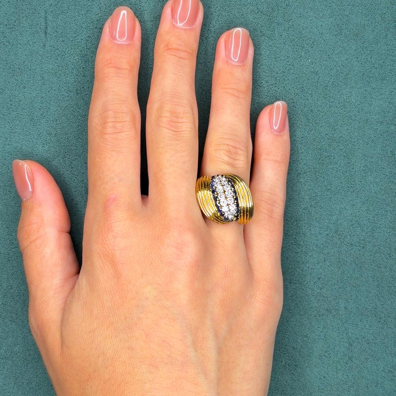 1960s 0.8ct Diamond and 1.0ct Sapphire 18K Yellow Gold Bombe Ring, Ribbed Gold Design