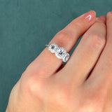 Three-Stone Diamond Halo Ring, 0.65 ct Center, 18K White Gold