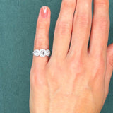 Three-Stone Diamond Halo Ring, 0.65 ct Center, 18K White Gold