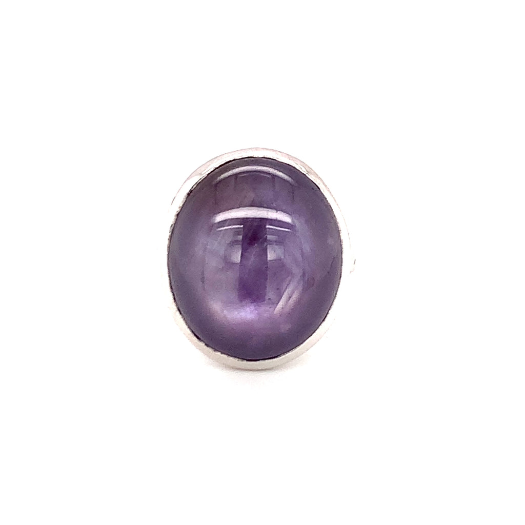 Mid-Century Oversized Purple Star Sapphire Ring, 18K White Gold, circa 1950s."