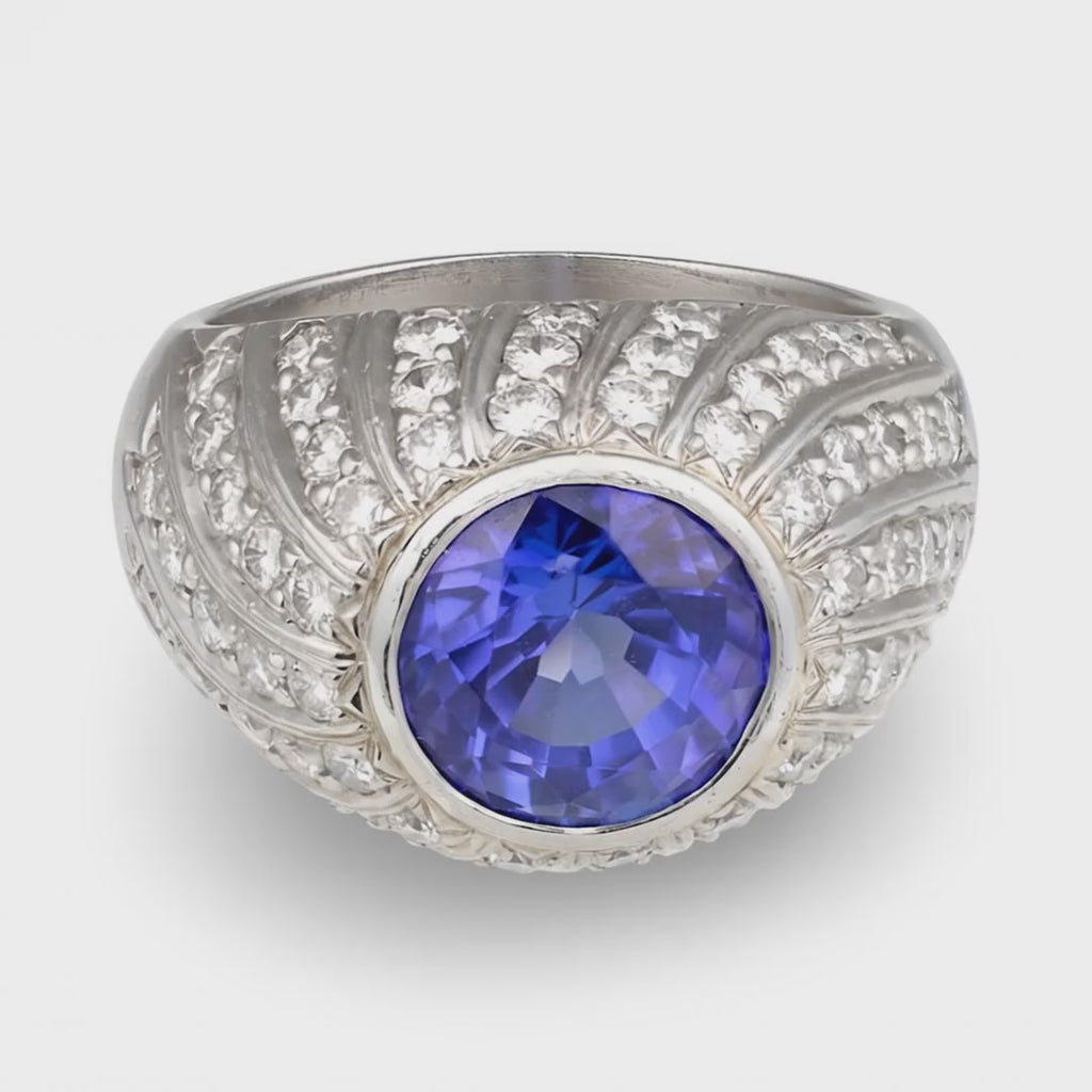 Tanzanite and Diamond Platinum Ring, 4.50 ct Bezel-Set Tanzanite, Circa 1970s