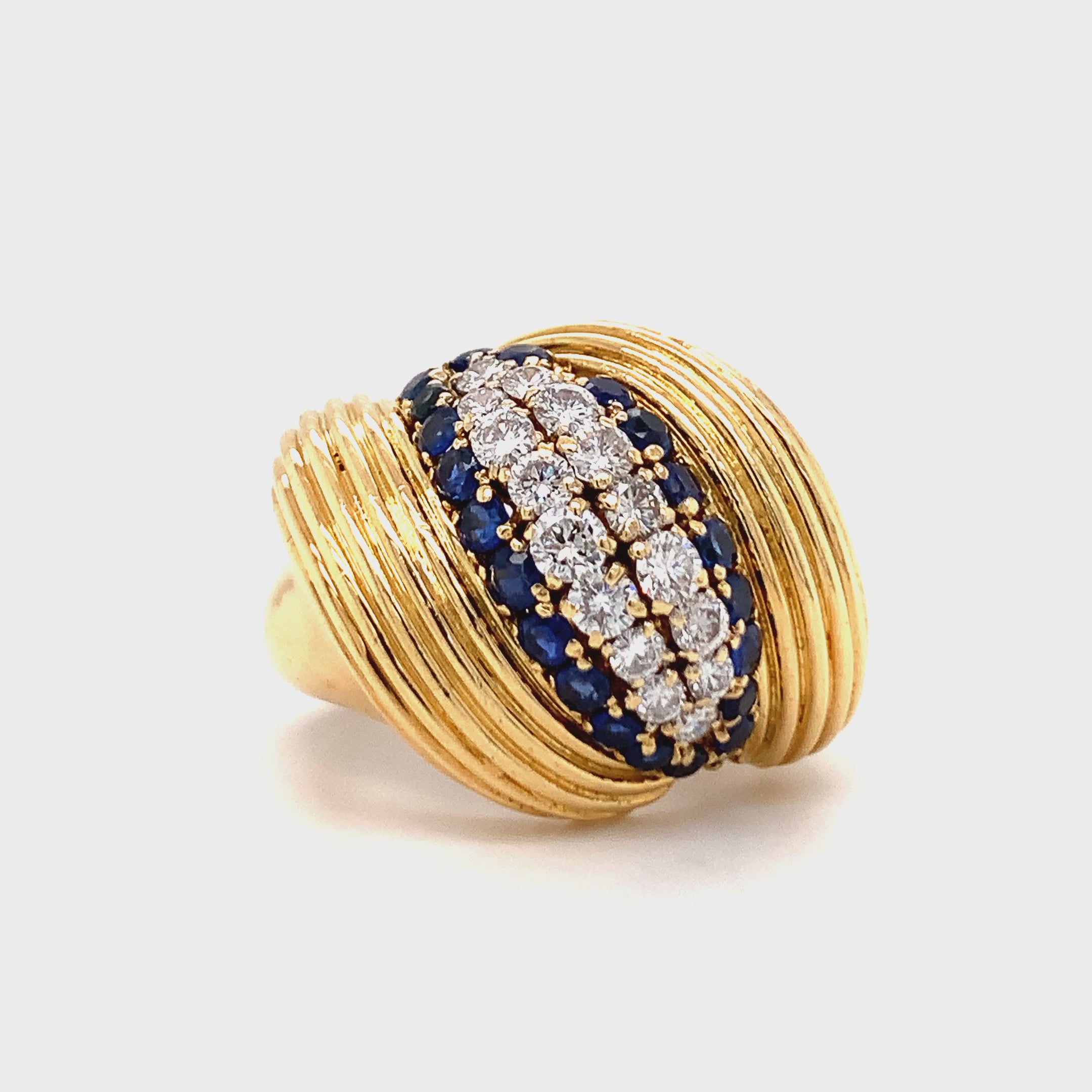 1960s 0.8ct Diamond and 1.0ct Sapphire 18K Yellow Gold Bombe Ring, Ribbed Gold Design
