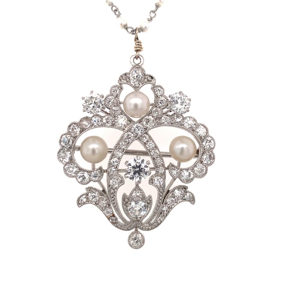 PLATINUM DIAMOND AND PEARL PENDANT