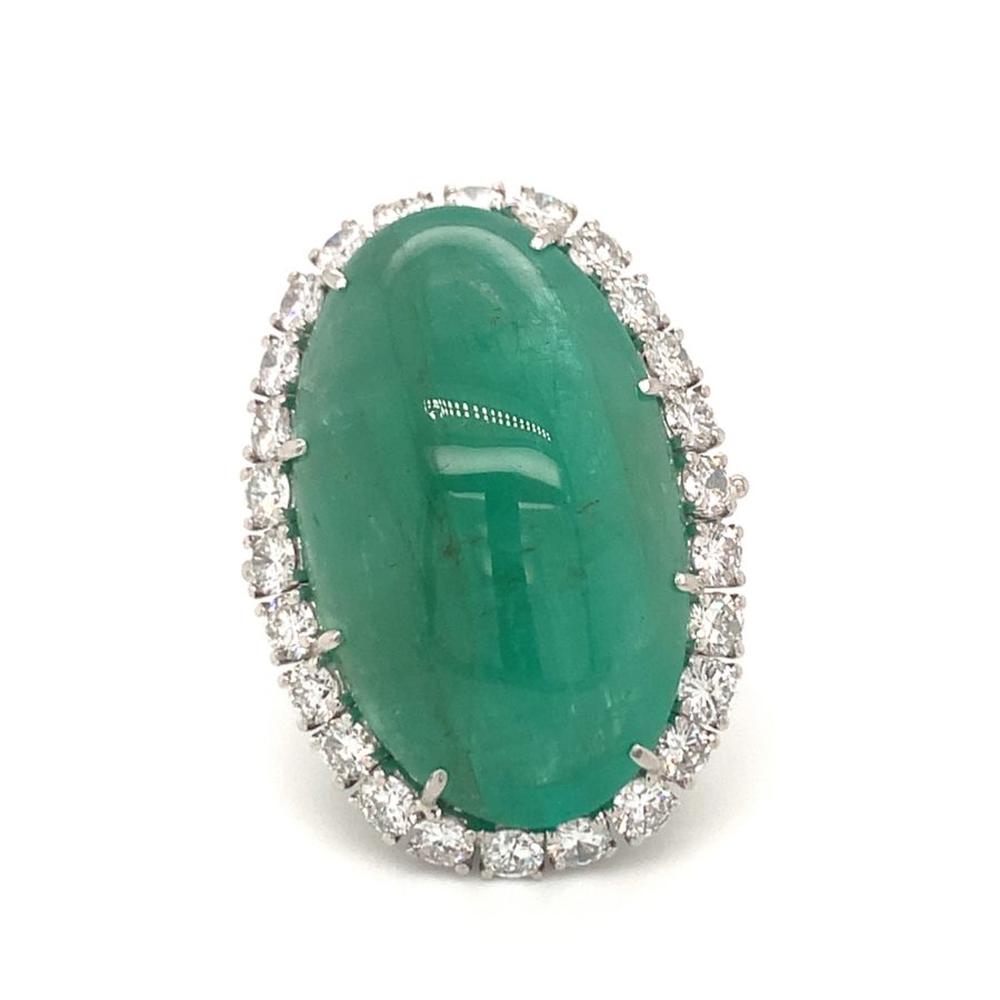 PLATINUM EMERALD AND DIAMOND RING