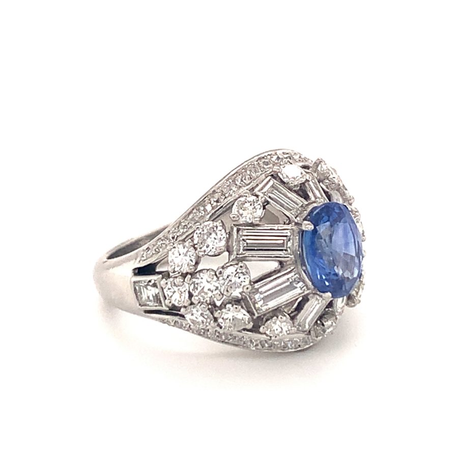 PLATINUM SAPPHIRE AND DIAMOND RING BY "MAUBOUSSIN"